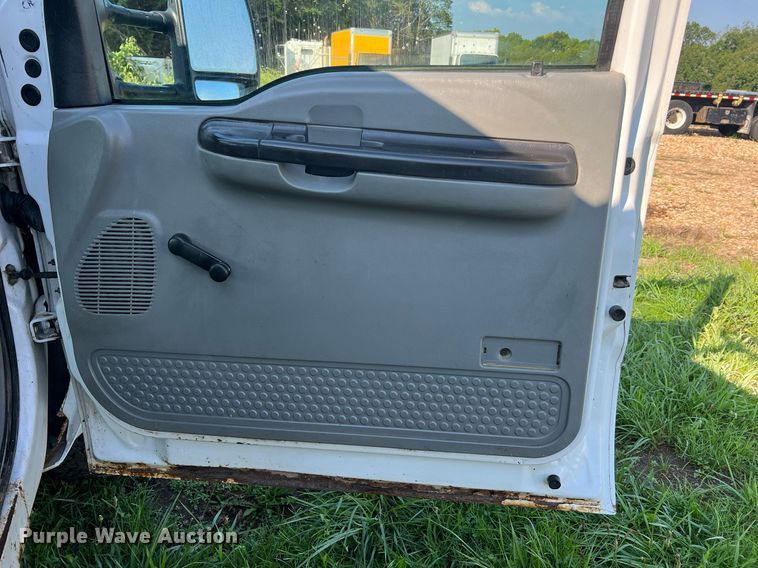 image for item NA9086 2005 Ford F350 Super Duty XL  Crew Cab utility bed pickup truck