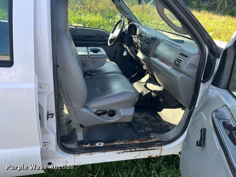 image for item NA9086 2005 Ford F350 Super Duty XL  Crew Cab utility bed pickup truck