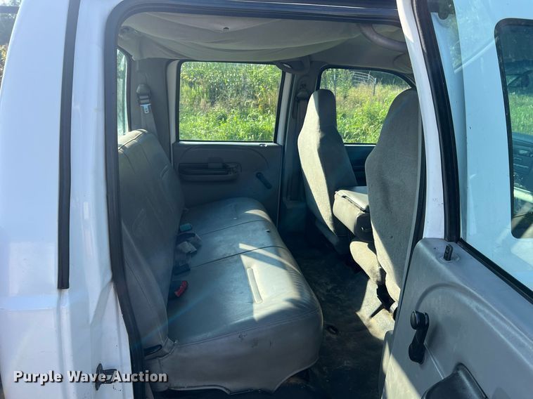 image for item NA9086 2005 Ford F350 Super Duty XL  Crew Cab utility bed pickup truck