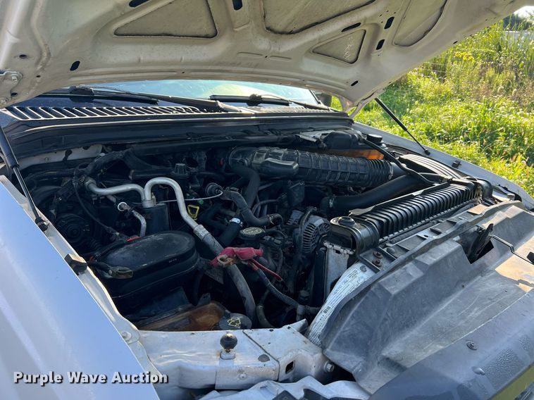 image for item NA9086 2005 Ford F350 Super Duty XL  Crew Cab utility bed pickup truck