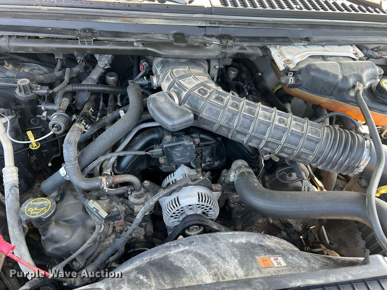 image for item NA9086 2005 Ford F350 Super Duty XL  Crew Cab utility bed pickup truck