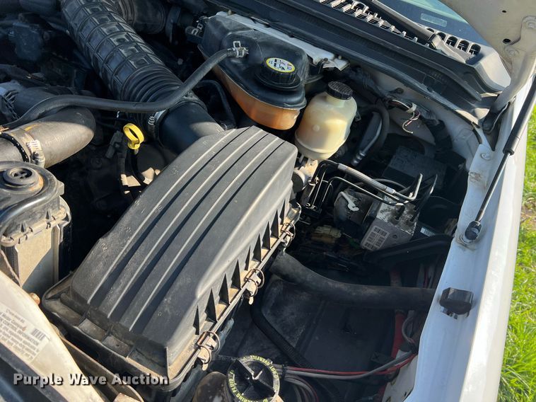 image for item NA9086 2005 Ford F350 Super Duty XL  Crew Cab utility bed pickup truck