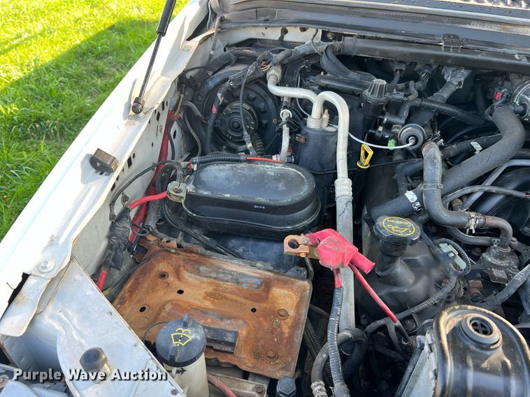 image for item NA9086 2005 Ford F350 Super Duty XL  Crew Cab utility bed pickup truck