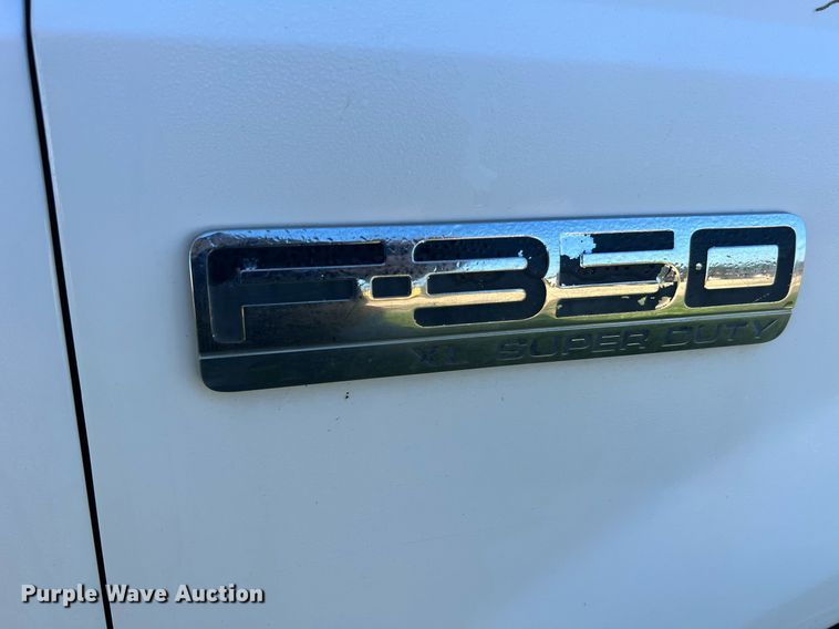 image for item NA9086 2005 Ford F350 Super Duty XL  Crew Cab utility bed pickup truck