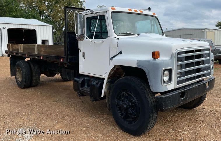 image for item NY9839 1980 International 1854  dump flatbed truck