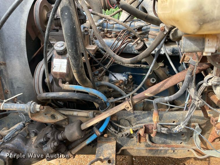 image for item NY9839 1980 International 1854  dump flatbed truck