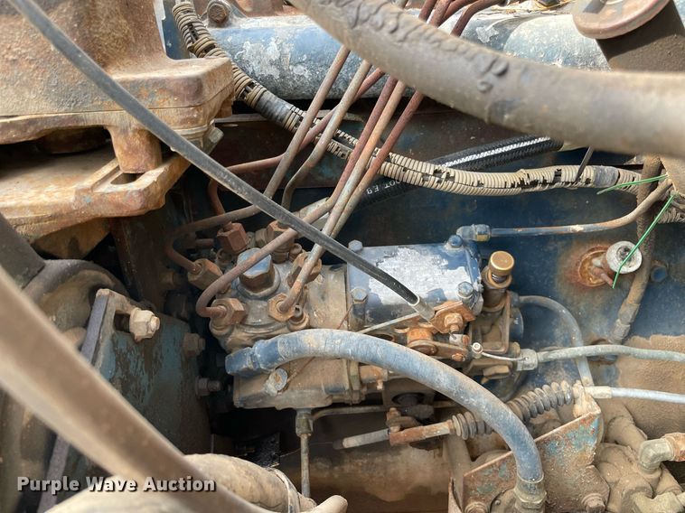 image for item NY9839 1980 International 1854  dump flatbed truck