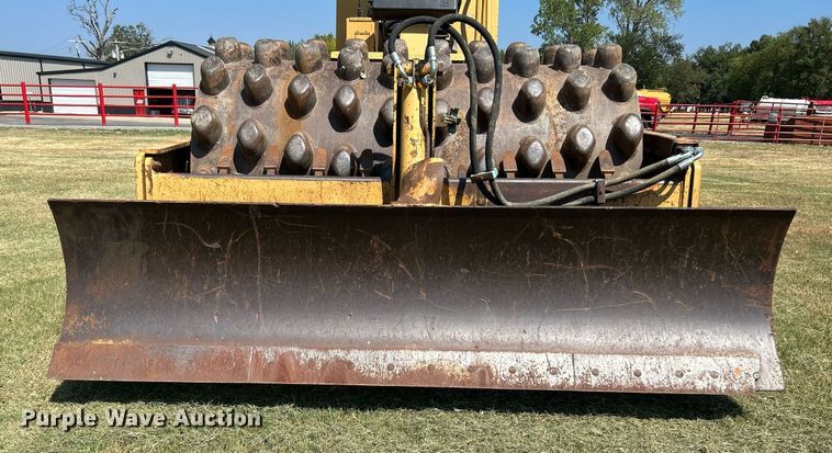 image for item DJ6321 1998 Caterpillar CP-563C  single drum roller