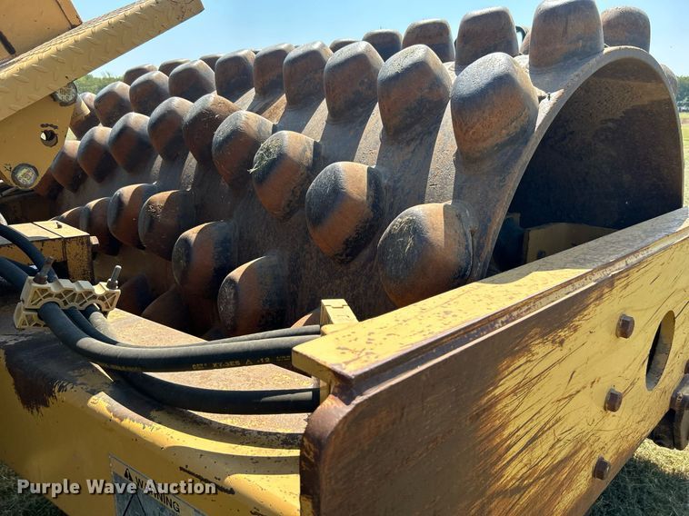 image for item DJ6321 1998 Caterpillar CP-563C  single drum roller