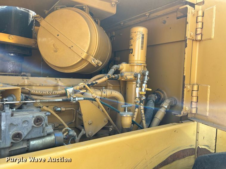 image for item DJ6321 1998 Caterpillar CP-563C  single drum roller