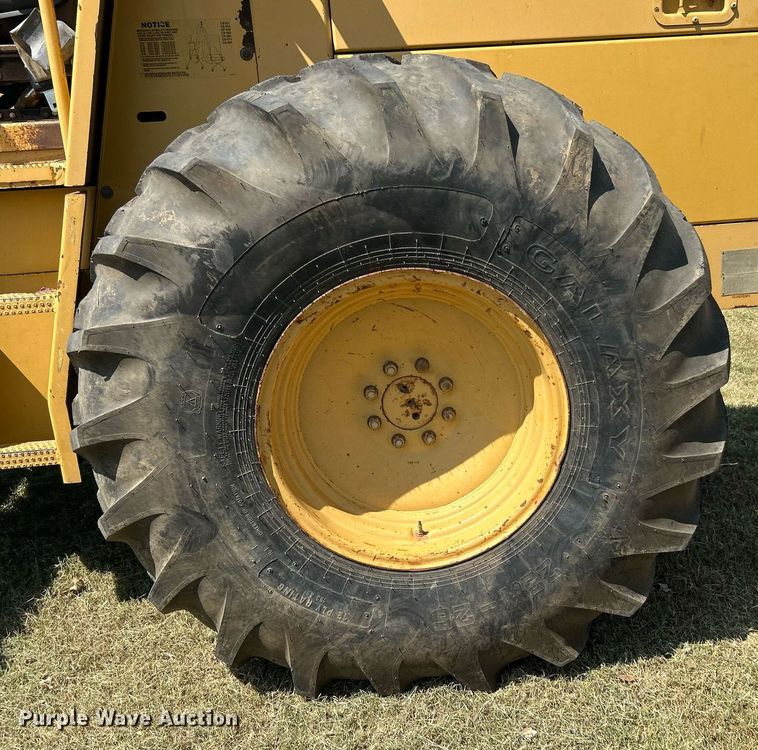 image for item DJ6321 1998 Caterpillar CP-563C  single drum roller