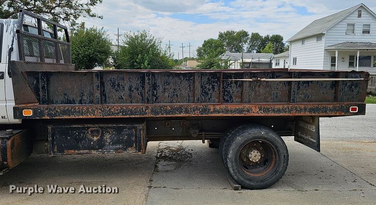 image for item DQ0210 1994 GMC TopKick  dump flatbed truck