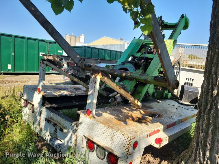 image for item IQ9933 2007 Norcal Waste Equipment NCCR-6000  dumpster delivery bed