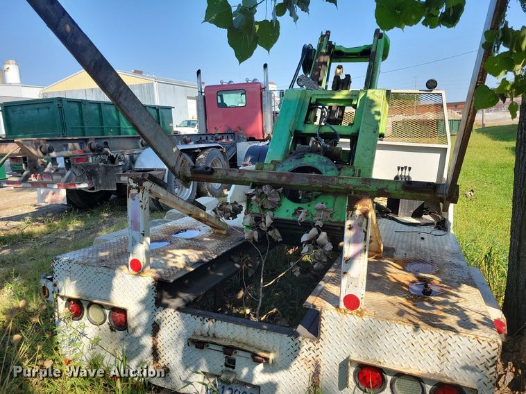 image for item IQ9933 2007 Norcal Waste Equipment NCCR-6000  dumpster delivery bed