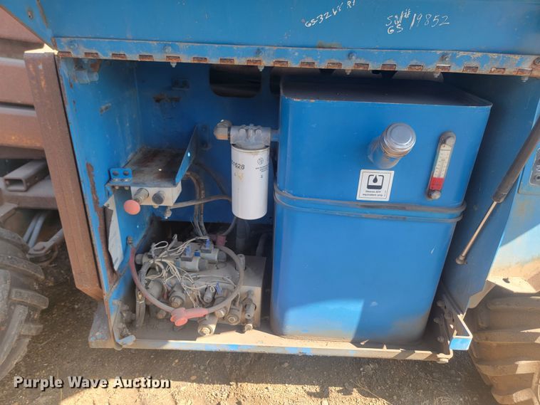 image for item KS9187 1999 Genie GS-3268RT  scissor lift