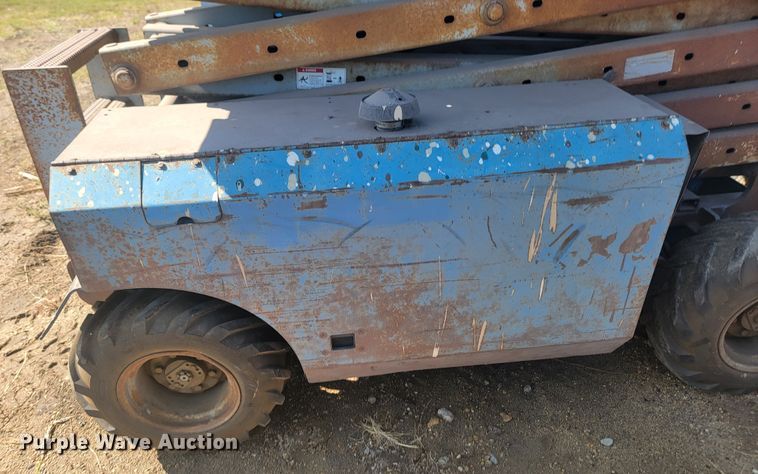 image for item KS9187 1999 Genie GS-3268RT  scissor lift