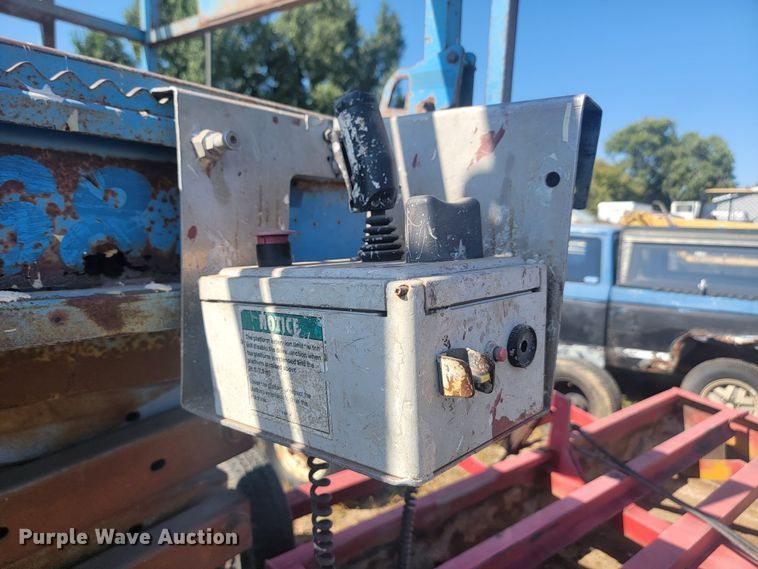 image for item KS9187 1999 Genie GS-3268RT  scissor lift