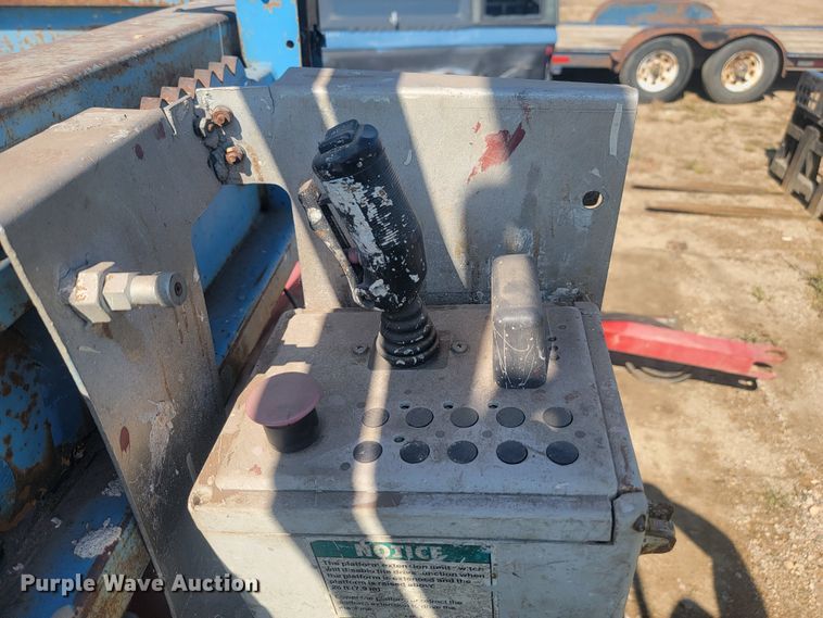 image for item KS9187 1999 Genie GS-3268RT  scissor lift