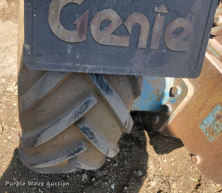 image for item KS9187 1999 Genie GS-3268RT  scissor lift