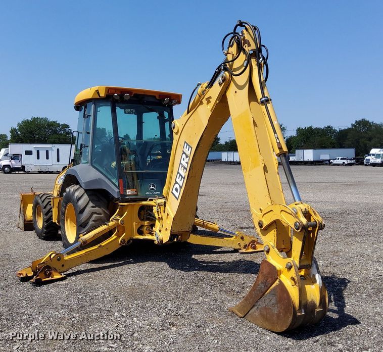 image for item KW9023 2004 John Deere 310SG  backhoe