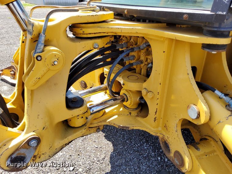 image for item KW9023 2004 John Deere 310SG  backhoe