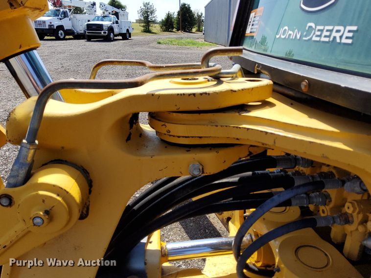 image for item KW9023 2004 John Deere 310SG  backhoe