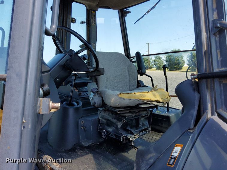 image for item KW9023 2004 John Deere 310SG  backhoe