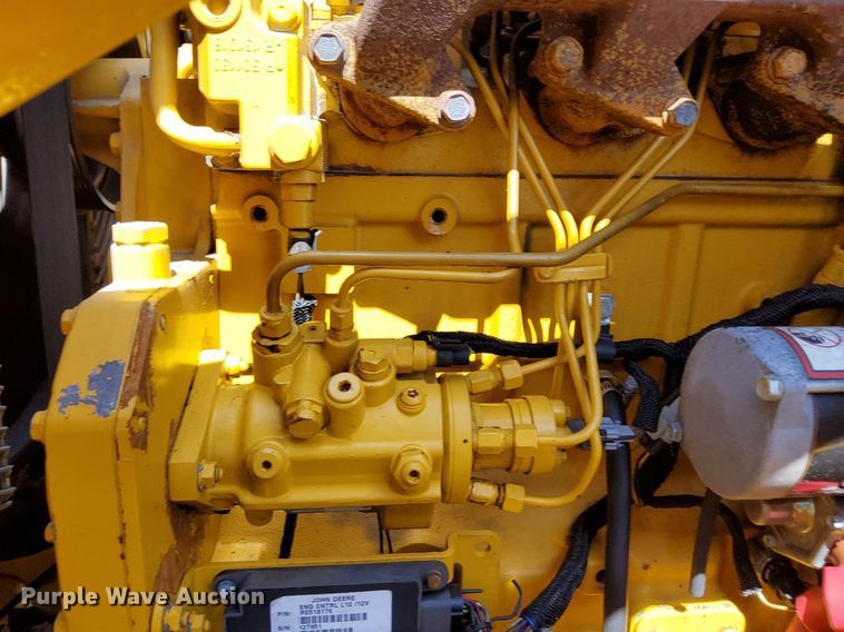 image for item KW9023 2004 John Deere 310SG  backhoe