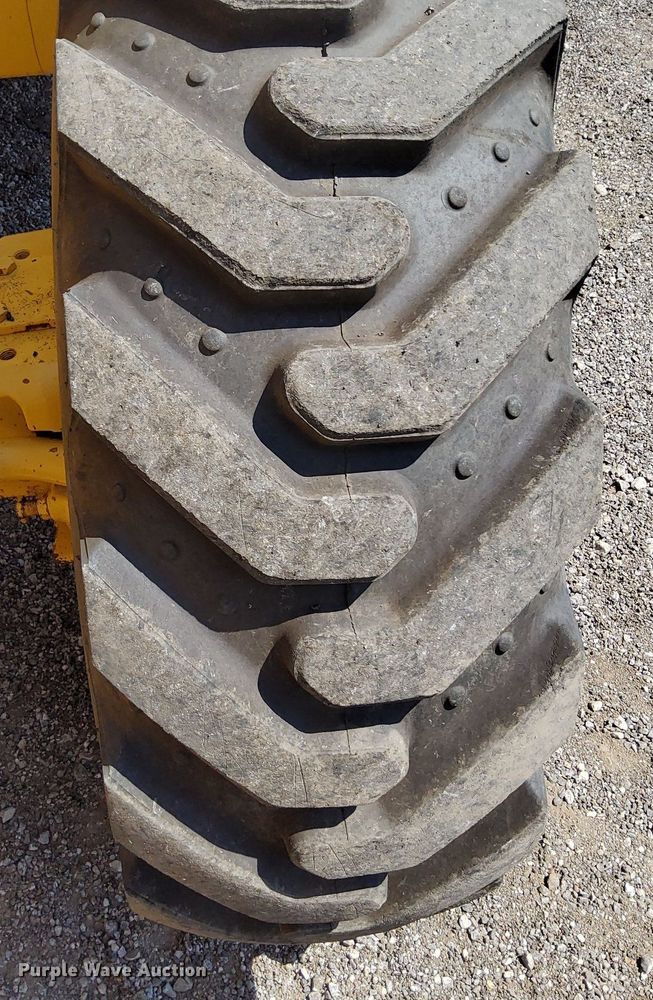 image for item KW9023 2004 John Deere 310SG  backhoe