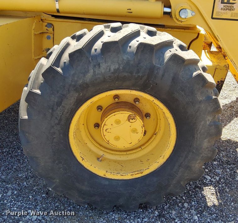 image for item KW9023 2004 John Deere 310SG  backhoe