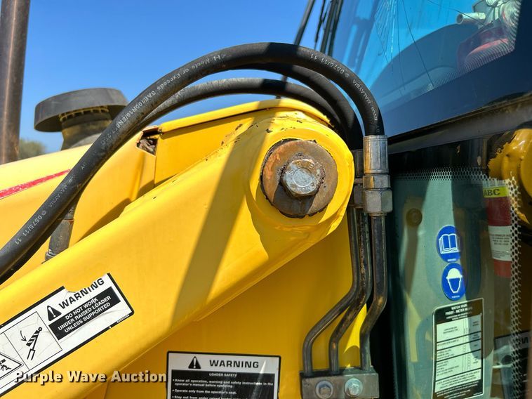 image for item KW9026 2002 New Holland LB75B  backhoe