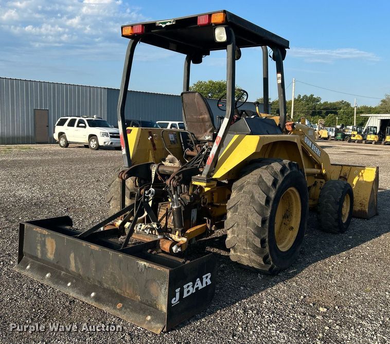 image for item KW9034 John Deere 210C  backhoe