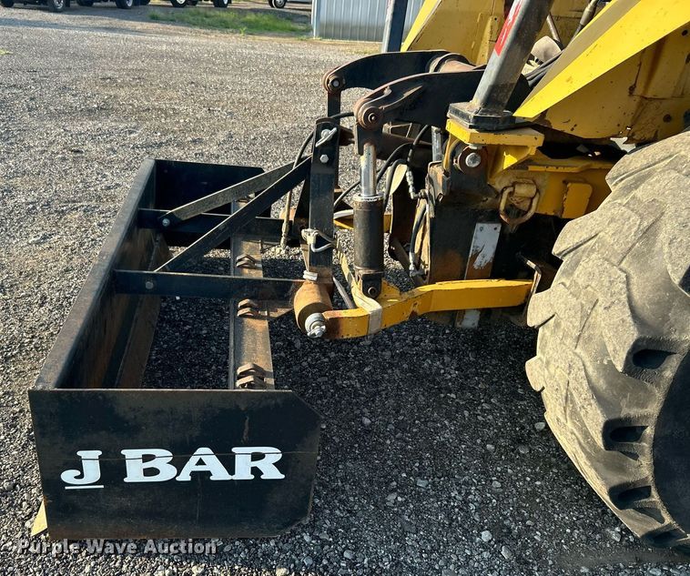 image for item KW9034 John Deere 210C  backhoe