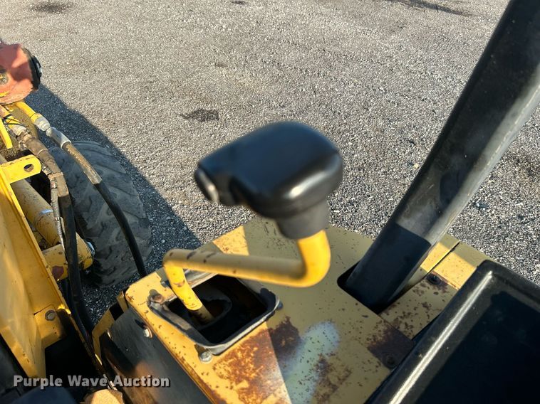 image for item KW9034 John Deere 210C  backhoe