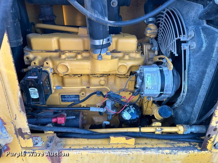 image for item KW9034 John Deere 210C  backhoe