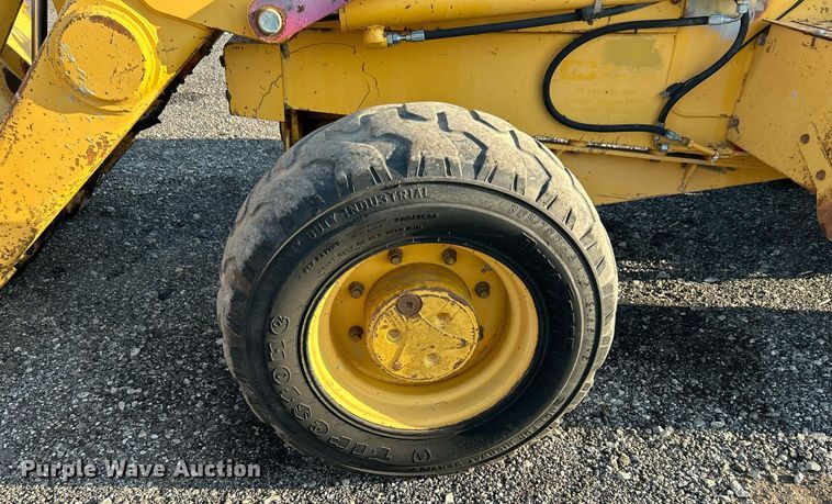 image for item KW9034 John Deere 210C  backhoe