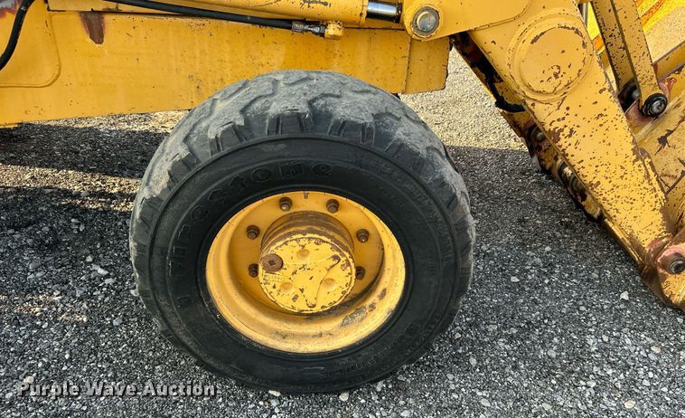 image for item KW9034 John Deere 210C  backhoe