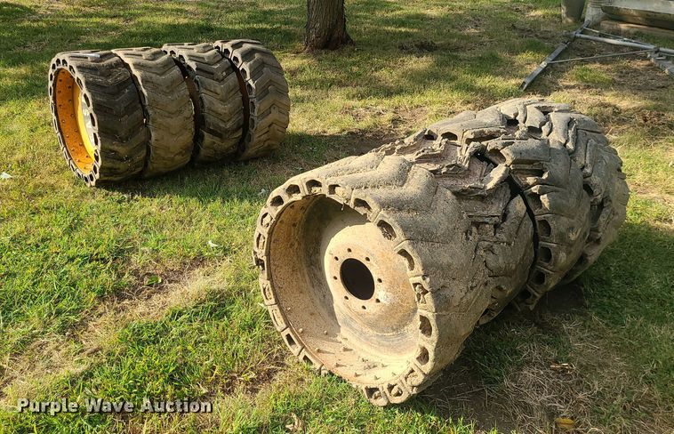 image for item MJ9368 (8) skid steer tires and wheels