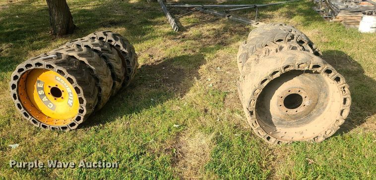 image for item MJ9368 (8) skid steer tires and wheels