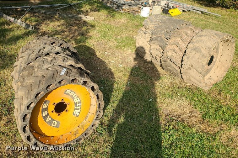 image for item MJ9368 (8) skid steer tires and wheels