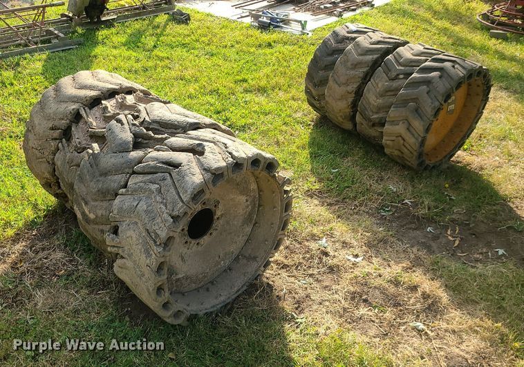 image for item MJ9368 (8) skid steer tires and wheels