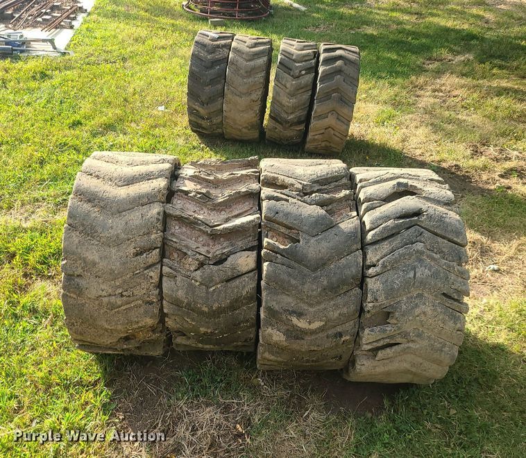 image for item MJ9368 (8) skid steer tires and wheels