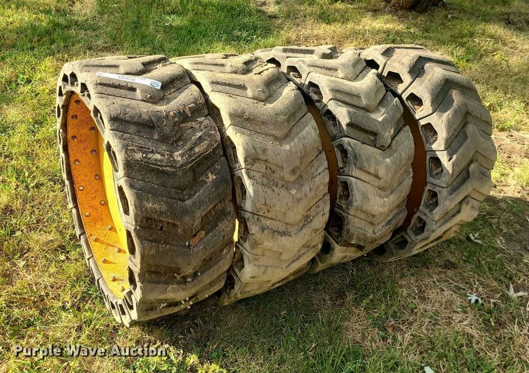 image for item MJ9368 (8) skid steer tires and wheels