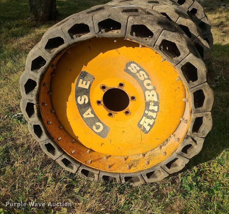 image for item MJ9368 (8) skid steer tires and wheels