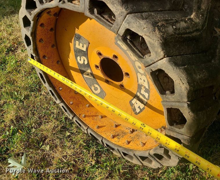 image for item MJ9368 (8) skid steer tires and wheels