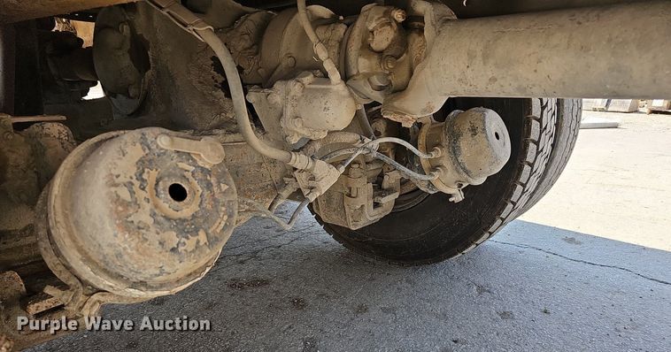 image for item NJ9766 1992 Mack DM690S  water truck