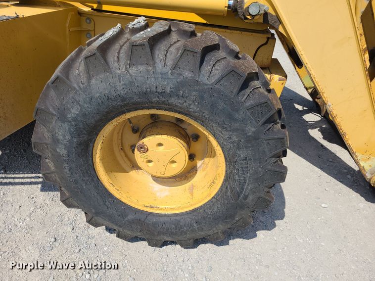 image for item DN8693 2003 John Deere 310SG  backhoe