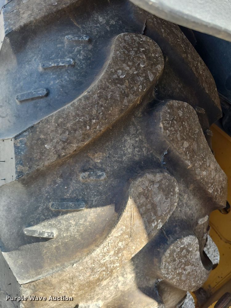 image for item DN8693 2003 John Deere 310SG  backhoe