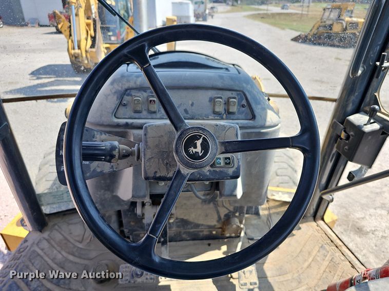 image for item DN8694 2005 John Deere 310SG  backhoe