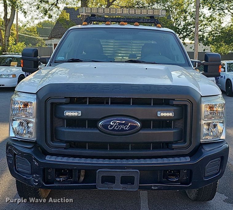 image for item LE9727 2014 Ford F350  Crew Cab utility bed pickup truck